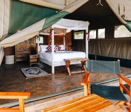 Tent interior with queen bed